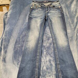 Mid rise bootcut miss me jeans